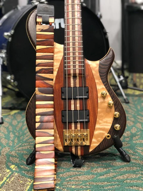 how to put on a guitar strap